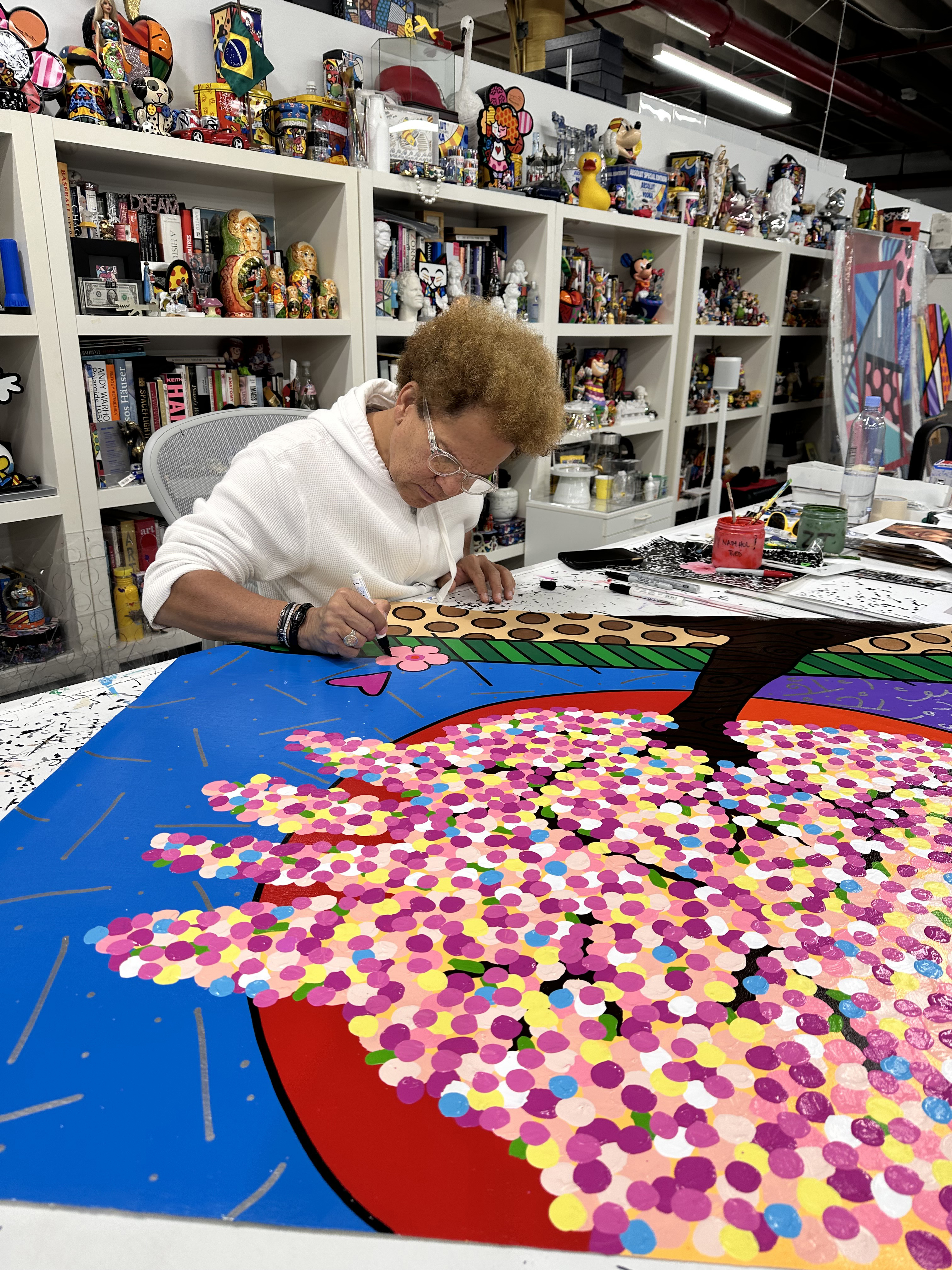 Romero Britto working in his studio